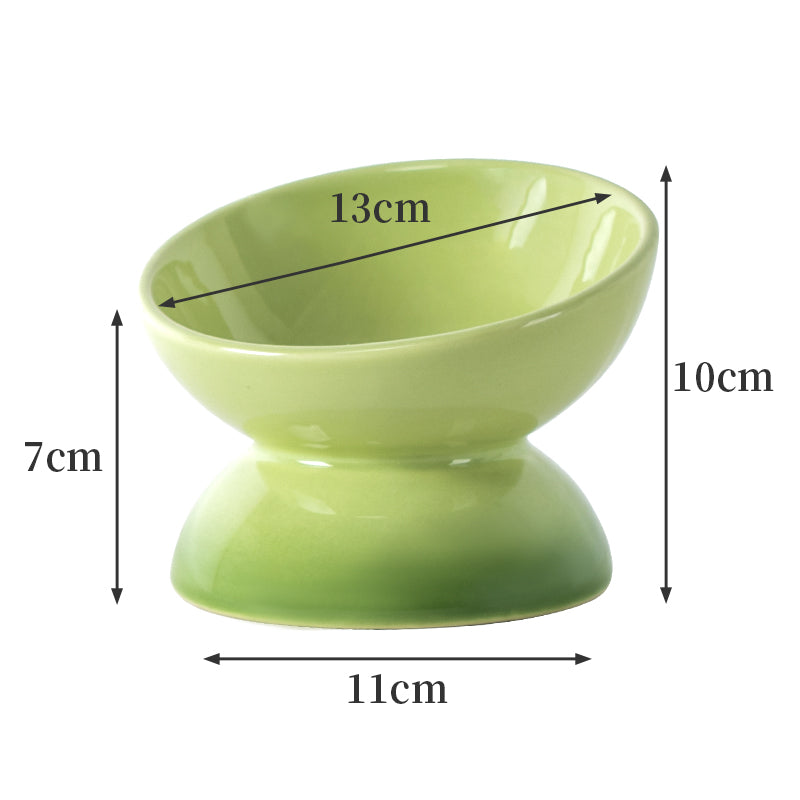 Green ceramic bowl with dimensions marked on a white background