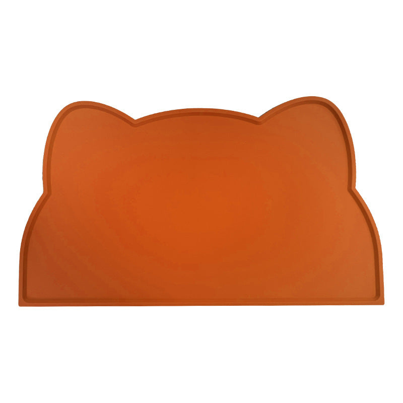 Orange pet mat with a cat-shaped design on a white background