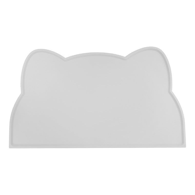 White cat-shaped cushion on a white background